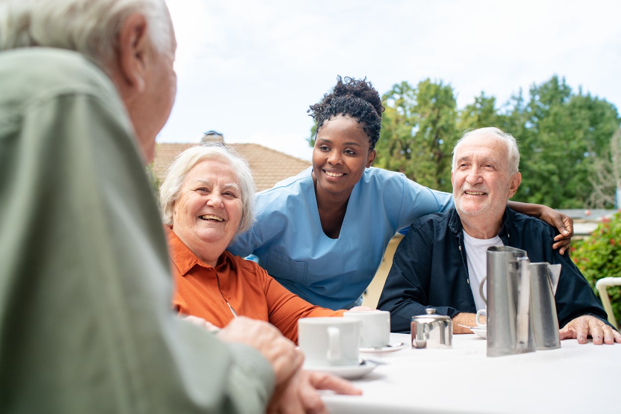 a group of people sitting at a table