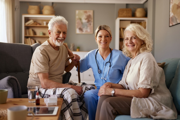 a man and a woman sitting on a table